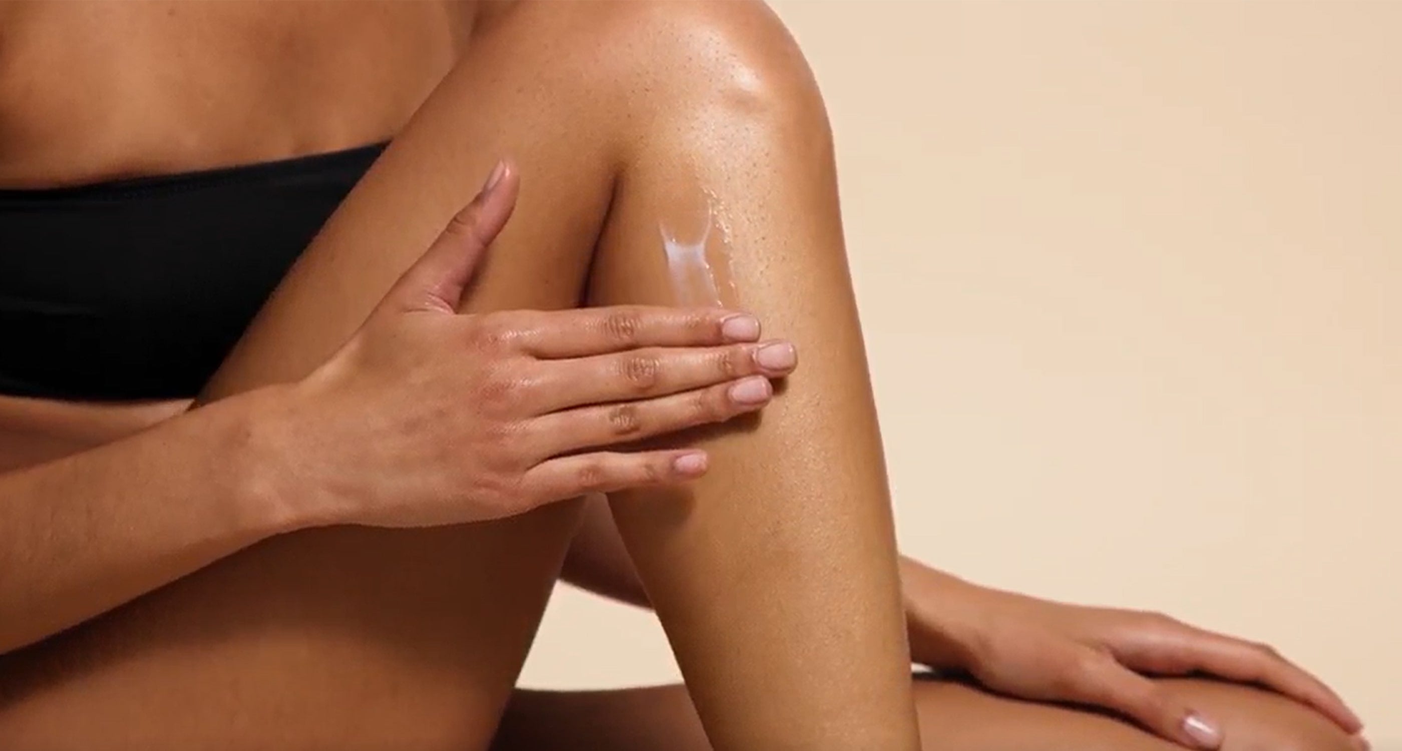 Step 3 on how to apply Self Glow by James Read sunless tanning: Build your desired glow, showcased by a female model applying the Endless Summer Body Moisturiser to her legs.